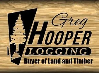 Greg Hooper Logging, Buyer of Land and Timber, logo on wood